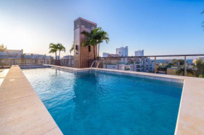 Porto Madero 201 - Apartamento no centro de Bombinhas - Rooftop com piscina e academia - À poucos metros da praia